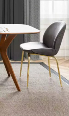 An incomparable chair made of high-quality material and stainless steel for the dining room.