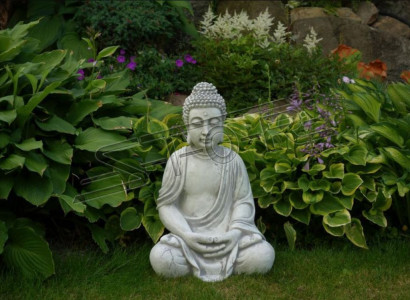 Buddha statue figure in stone look. Large sculpture for decorative garden.