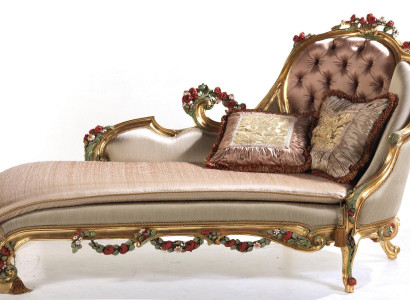 Luxurious chaise longue with decorative carvings