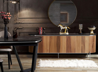 Luxurious dining room set consists of a modern black sideboard and mirror.