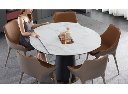 A stylish round dining table for your modern-style dining room.