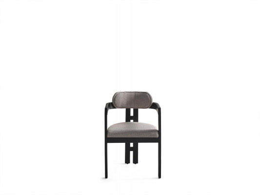 A state-of-the-art chair with an unusual shape and interesting legs with a comfortable gray-black backrest for the dining room.