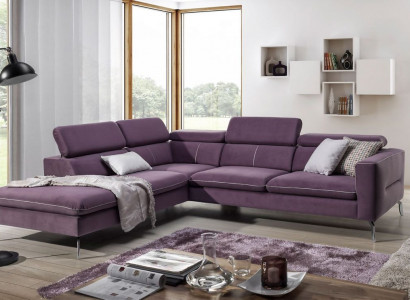 A functional, stylish corner sofa in a modern style for your home in purple luxury upholstery.